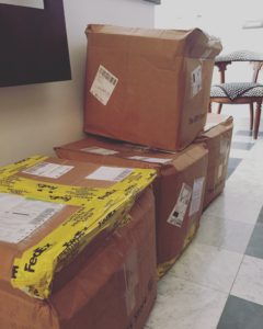 Our boxes arrived from California--we survived Italian customs!
